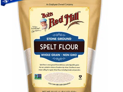 Harina de espelta integral Bob’s Red Mill 22 oz (624 g) en empaque resellable, molida en piedra, producto non-GMO ideal para panadería y repostería saludable.